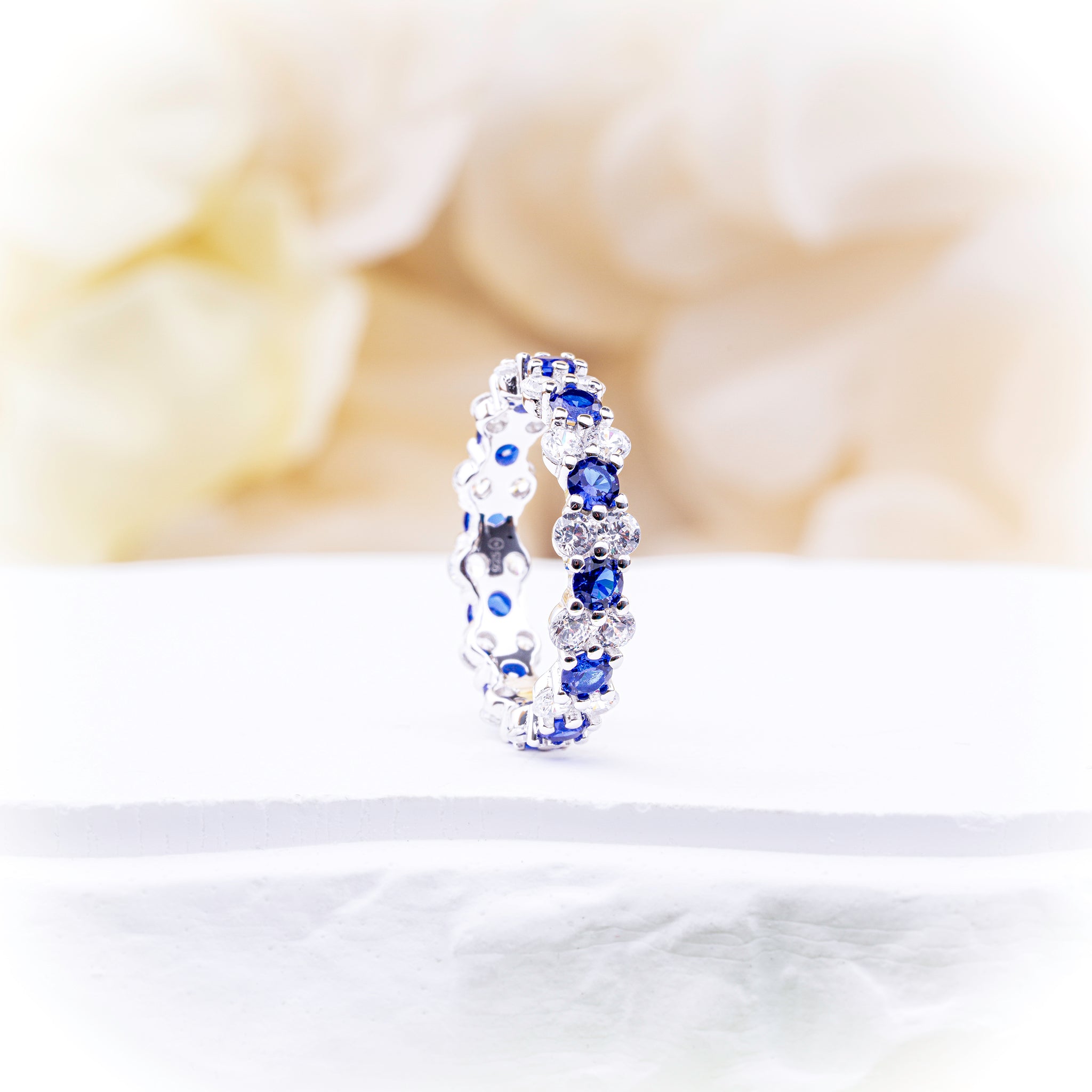 Eternity Band with Blue and White Zirconia Stones