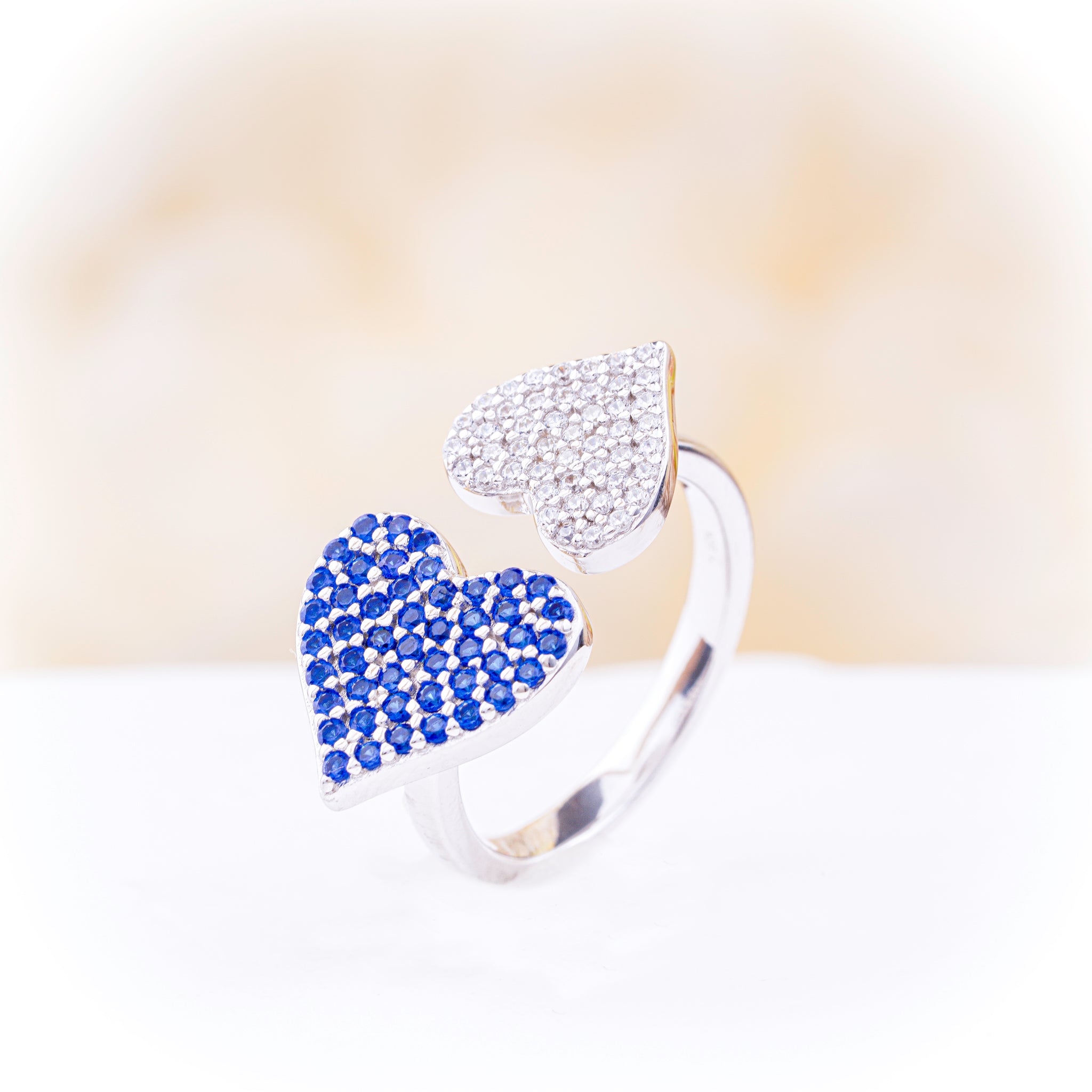 Double Heart Ring with Blue and White Zirconia